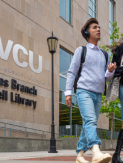 A student walking from the library